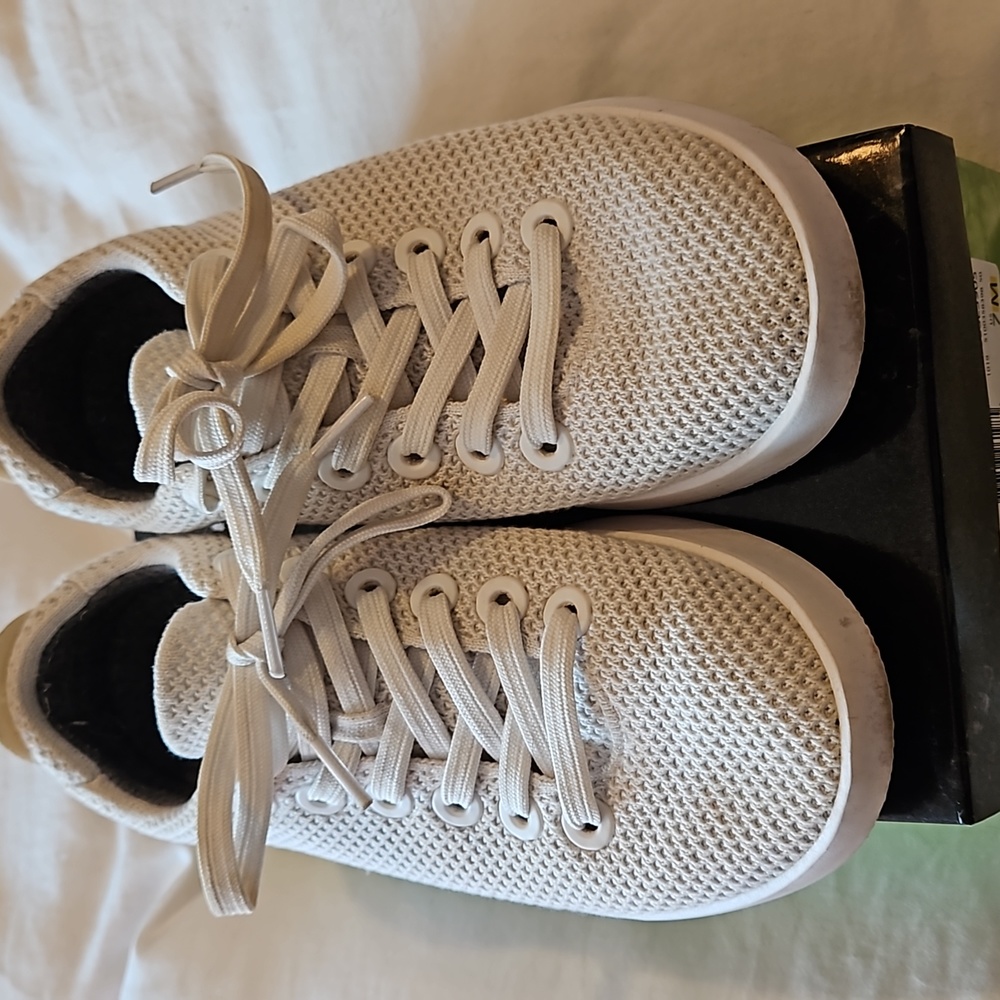 White knit AllBirds sneakers